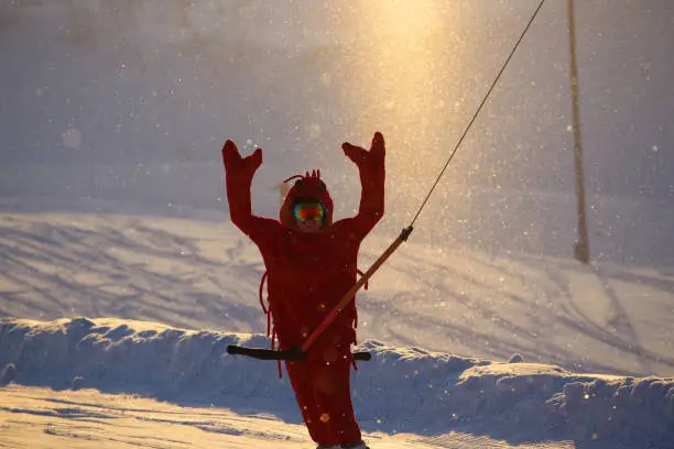 Photo of Snowboarder in funny shrimp costume