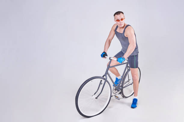 istock A handsome sports man sits on a Bicycle 926010274