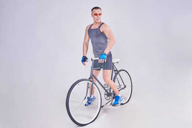 istock A handsome sports man sits on a Bicycle 926010302