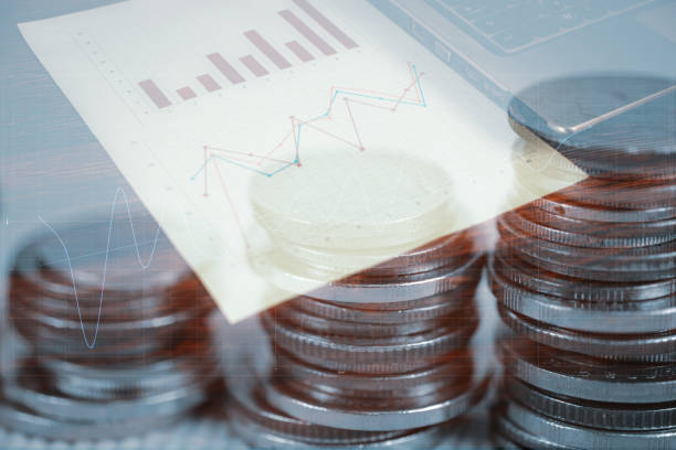 istock Double exposure of coin stack and notebook laptop computer with financial graph on white paper business planning vision and finance analysis concept. 926011060