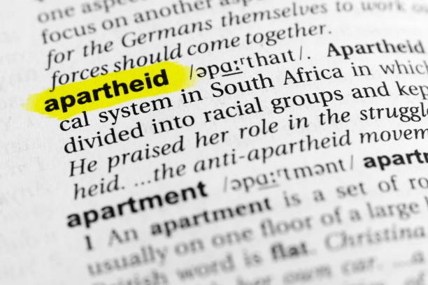 Highlighted English word "apartheid" and its definition in the dictionary Highlighted English word "apartheid" and its definition in the dictionary. apartheid stock pictures, royalty-free photos & images