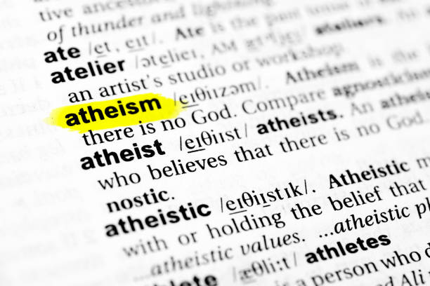 evidenziata la parola inglese "ateismo" e la sua definizione nel dizionario - urgent parola inglese foto e immagini stock