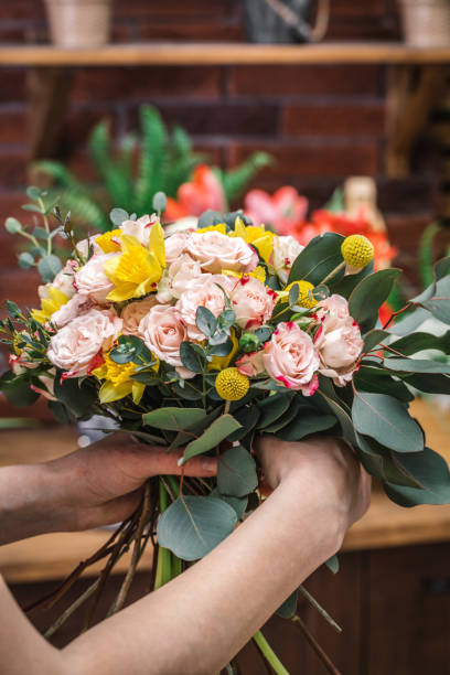 istock Floral shop worker holding beautiful bunch 926026084