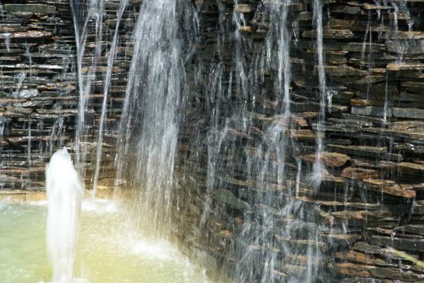 istock Cascade waterfall in the garden. 926029858