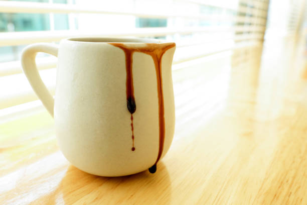 istock drops of chocolate syrup on the side of a ceramic mug 926036376