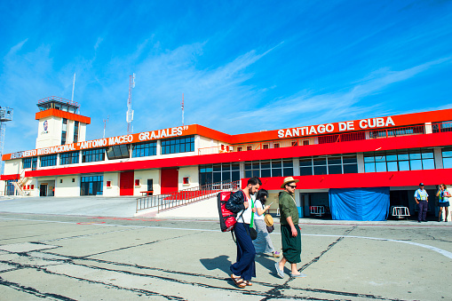 Tourists and workers on Antonio Maceo Grajales Airport in Santiago de Cuba, Cuba