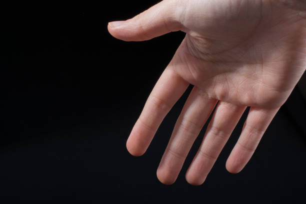 istock Five  fingers of a human hand partly seen in view 926047758