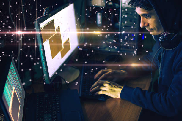 istock hacker in the dark breaks the access to steal information 926047884