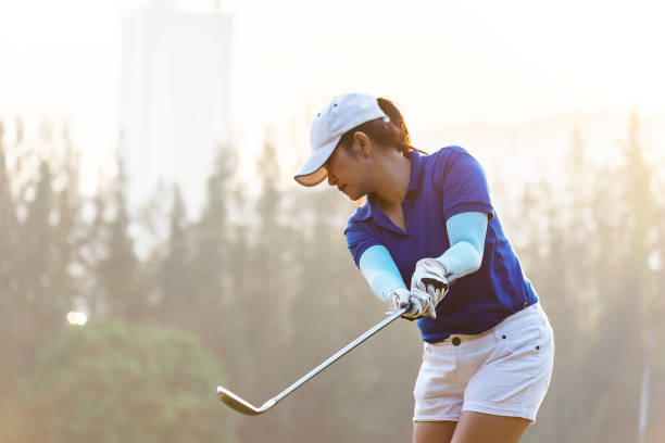 istock Golf ball and tee on green grass background.Golfers hit sweeping and keep golf course in the summer for relax time 926051234