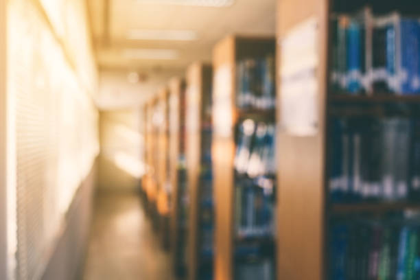 istock Blurry of library and blur of bookshelf 926055020