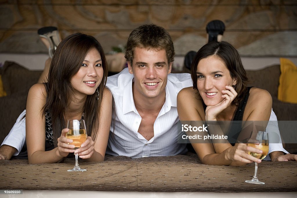 Tres amigos - Foto de stock de Acostado libre de derechos