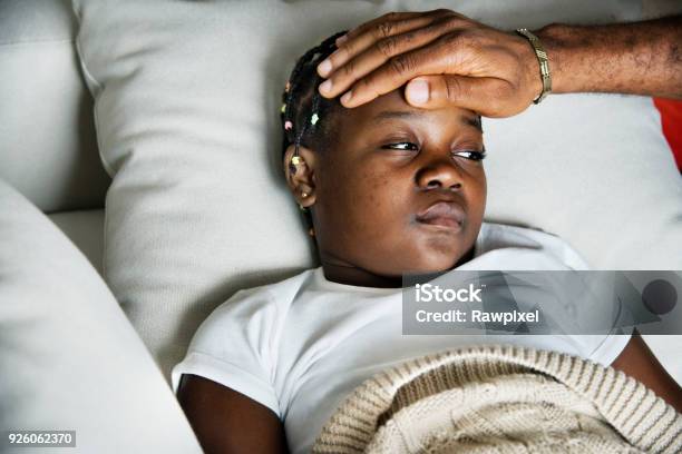Girl Sleeping With Sickness On The Bed Stock Photo - Download Image Now - Child, Illness, Fever