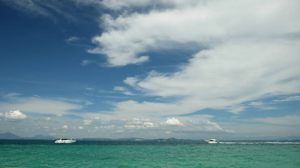 istock Blue sky and white clouds over the sea , summer vacation 926062484