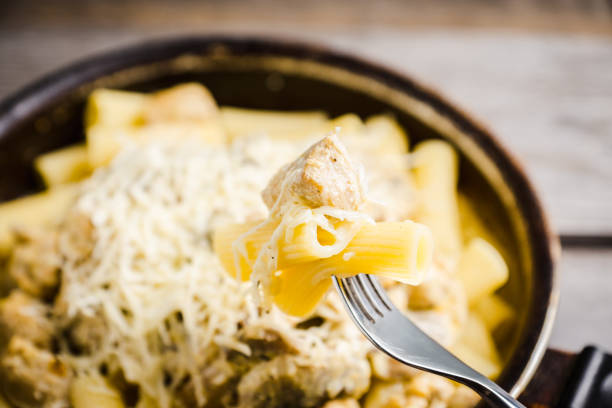 Fresh pasta with meat, mushrooms and cheese
