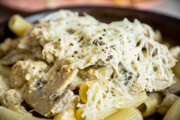 istock Fresh pasta with meat, mushrooms and cheese 926066134