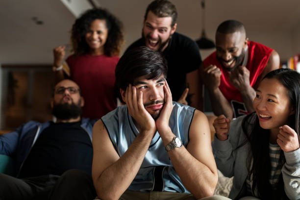 istock Friends cheering sport league together 926066202