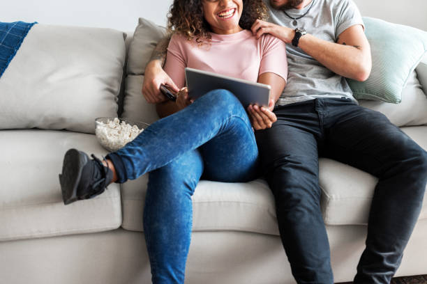 istock Couple relaxing at home 926066894