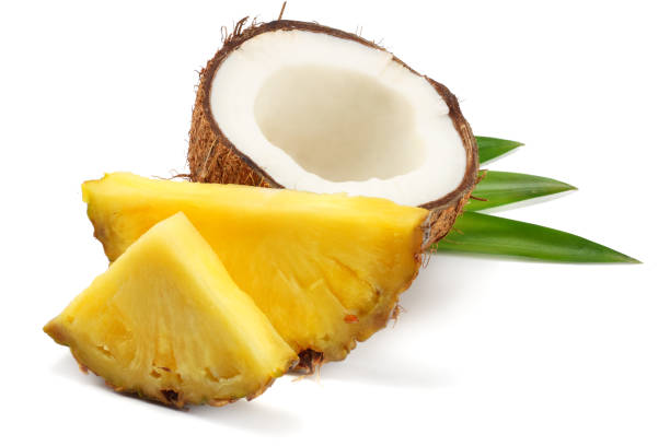 istock Coconut with pineapple slices and green leaves isolated on white background 926070810
