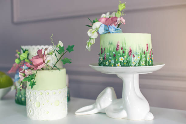 istock Wedding spring cake decorated with colorful flowers and hydrangeas. Desserts for a festive summer mood 926077114