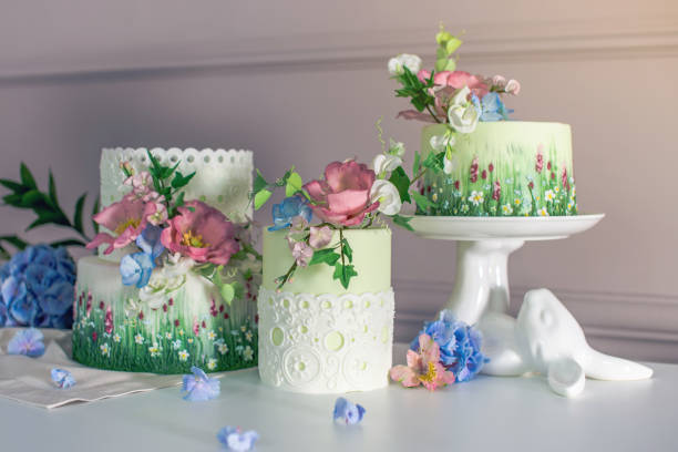 istock Wedding spring cake decorated with colorful flowers and hydrangeas. Desserts for a festive summer mood 926077118