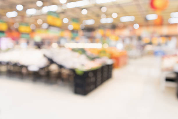 istock Abstract supermarket grocery store blurred defocused background with bokeh light 926078662