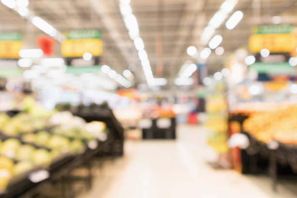istock Abstract supermarket grocery store blurred defocused background with bokeh light 926078664