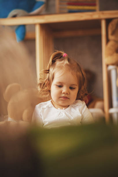 istock Baby playing in kids room 926081516