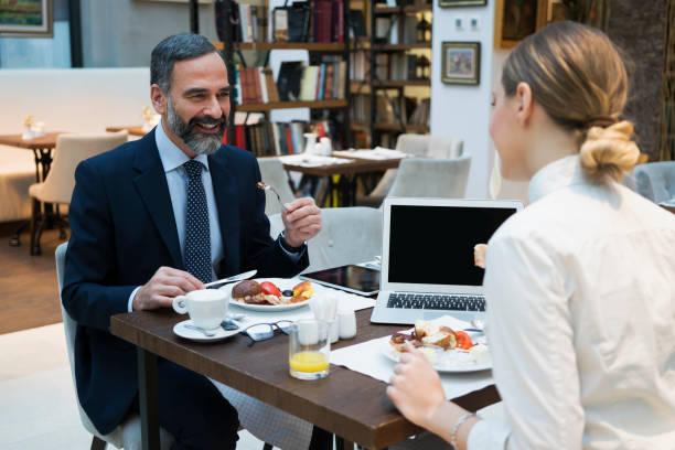 istock Business people have a meal in hotel restaurant 926081950