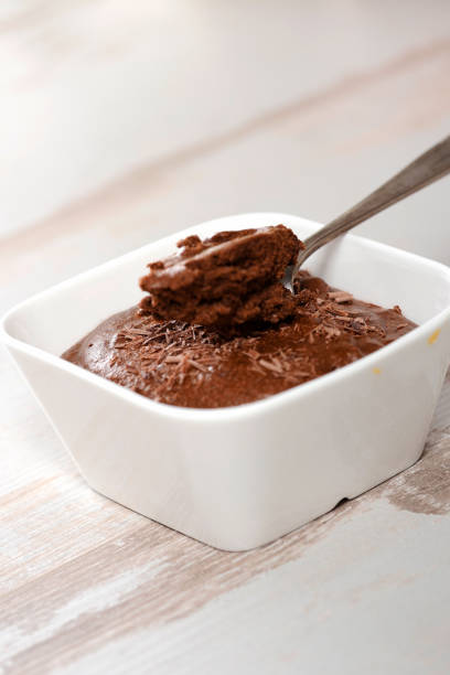 a close up of dark chocolate mousse