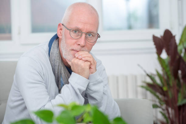 istock portrait of a middle-aged man with a beard and glasses 926085572