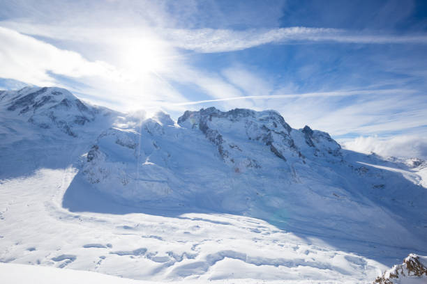 istock The sun shines out across a glacier before the Matterhorn 926085806