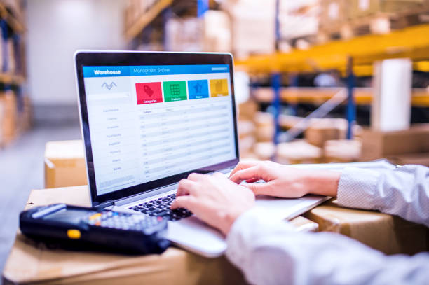istock Woman warehouse worker or supervisor with laptop 926086024