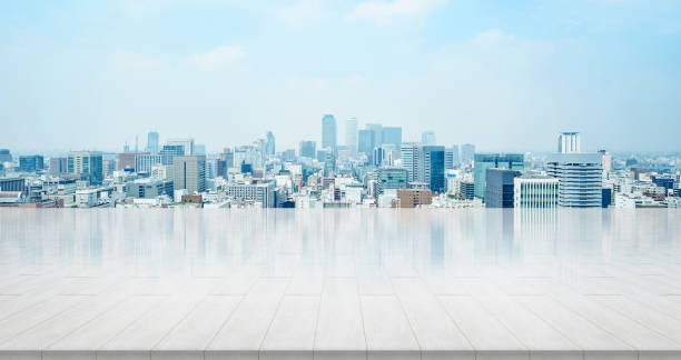 empty stone panel ground with panoramic city skyline aerial view under bright sun and blue sky of nagoya, Japan Business and design concept - empty stone panel ground with panoramic city skyline aerial view under bright sun and blue sky of nagoya, Japan for mockup or montage product shinjuku ward photos stock pictures, royalty-free photos & images