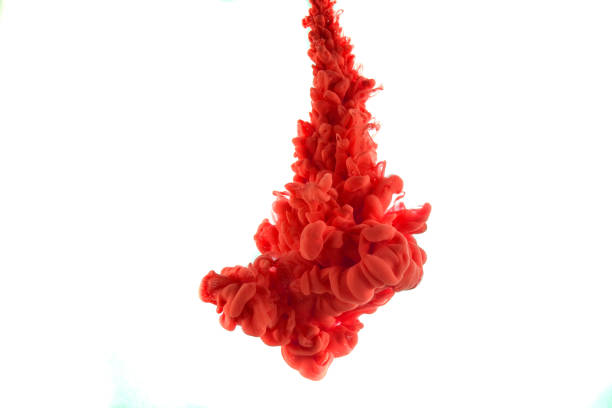 istock red dye in water on white background 926092634