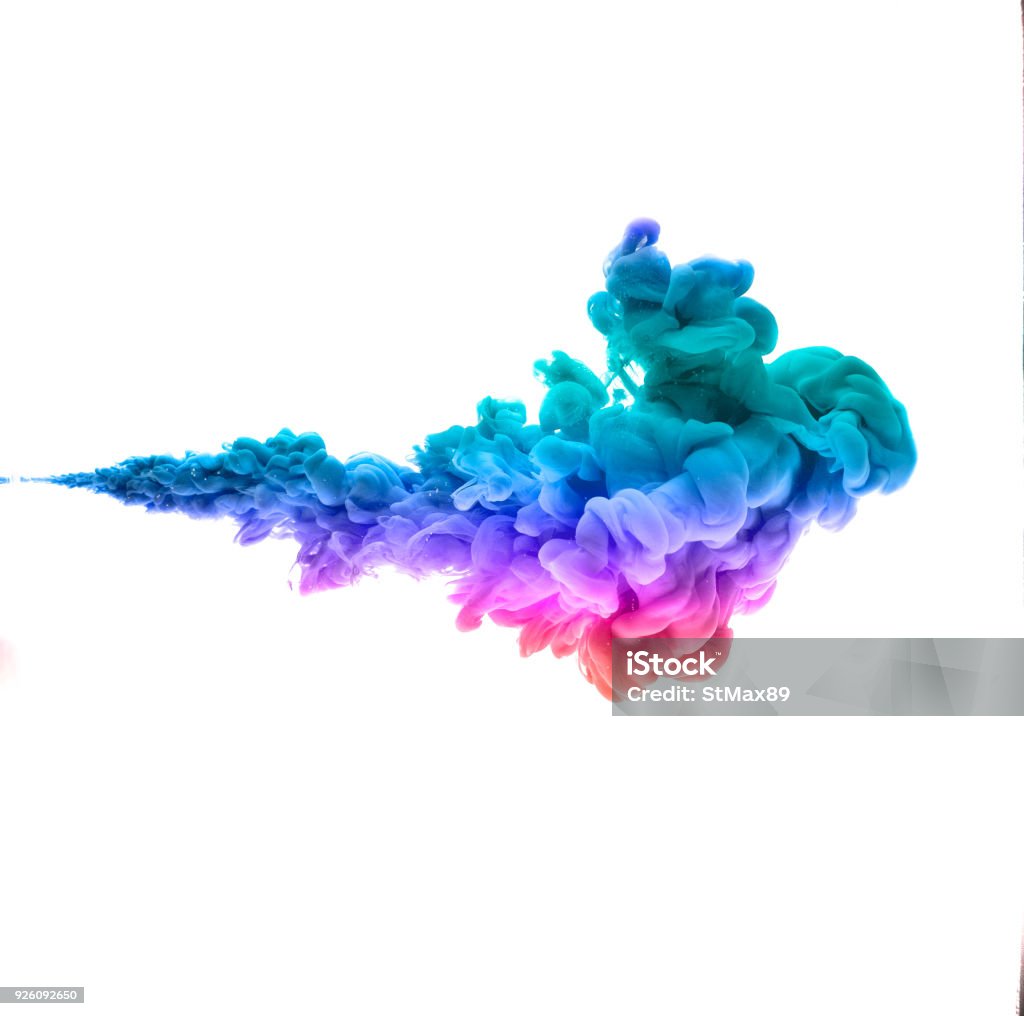 colorful dye in water on white background Water Stock Photo