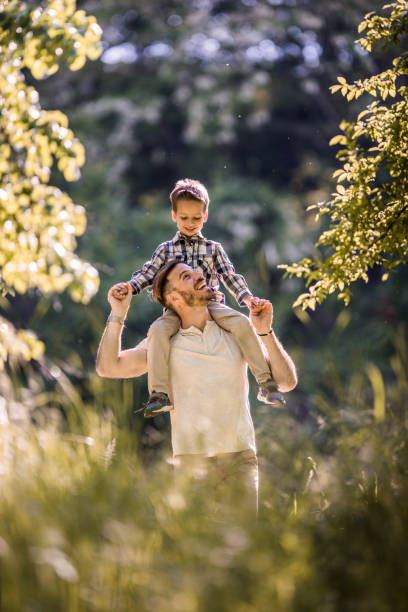 istock Happy father having fun with his small son in springtime. 926101458