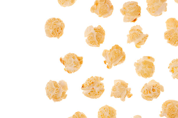 istock Popcorn flakes as decorative border with flying corn, isolated, with copy space. 926101578