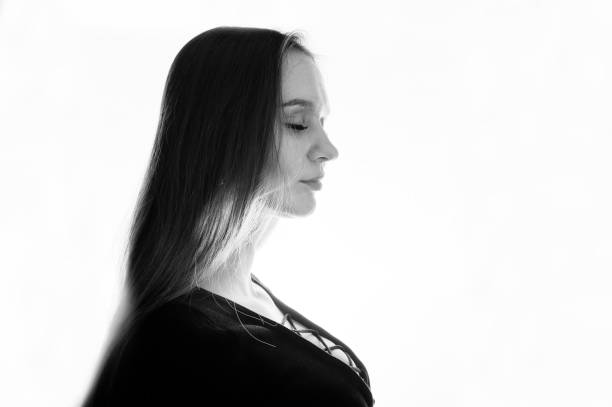 istock Studio shot of side view brunette girl at white background. 926101794