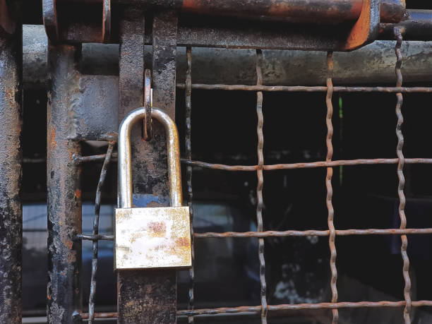 istock Old Rusty Lock of Small Warehouse Door 926102382