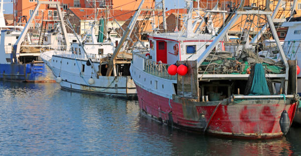 istock red fishing boat 926108390