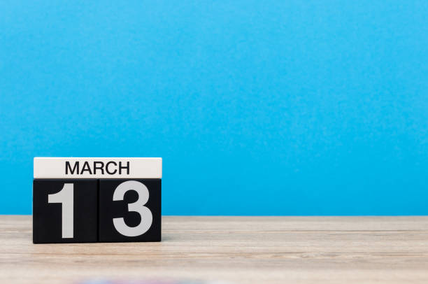 istock March 13th. Day 13 of march month, calendar on light blue background. Spring time, empty space for text, mockup 926117094