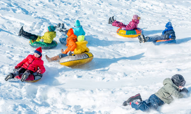 istock Children's Active Leisure at Sunny Winter Day 926125336