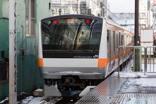 Tokyo, Japan - January 18, 2016 : JR Chuo Line (Rapid) Train at the Ogikubo Station in Tokyo, Japan.Tokyo, Japan. Chuo Line (Rapid) is one of the major railway lines in Japan.