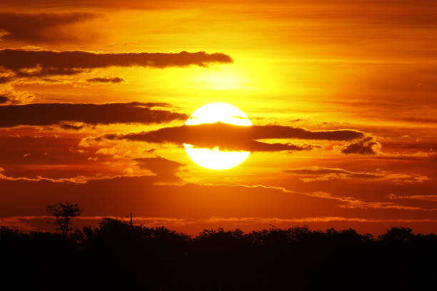 Sunset clouds African sky savanna wilderness safari dawn dusk clouds stock photo