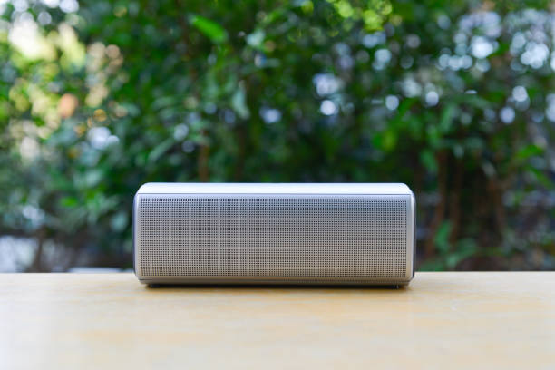 Wireless speaker with green nature background
