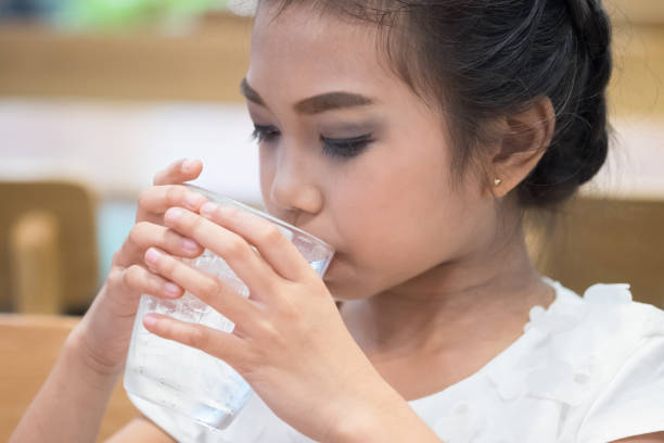 istock girls are drinking water 926144578