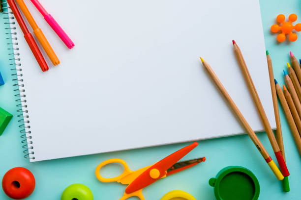 istock Top view on colorful paints and brushes. Creative ideas, creativity and early learning. Education concept. 926152454