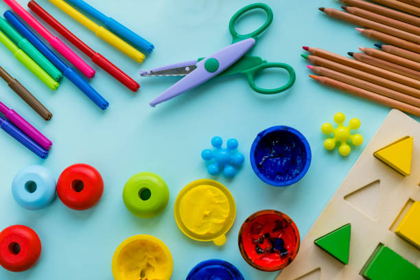 istock Top view on colorful paints and brushes. Creative ideas, creativity and early learning. Education concept. 926152496