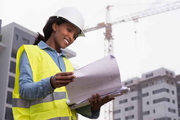 istock Architect woman at a building site. 926153288