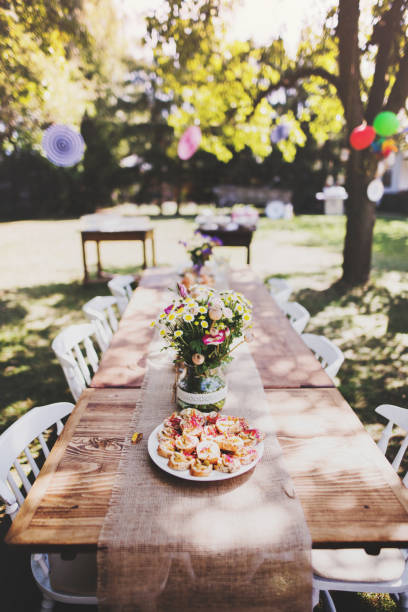 istock Table set for a garden party or celebration outside. 926155378